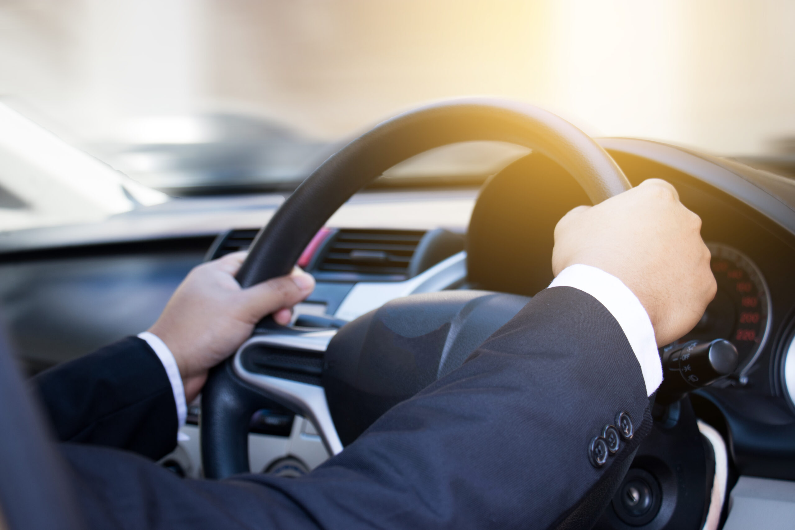Businessman driving his car